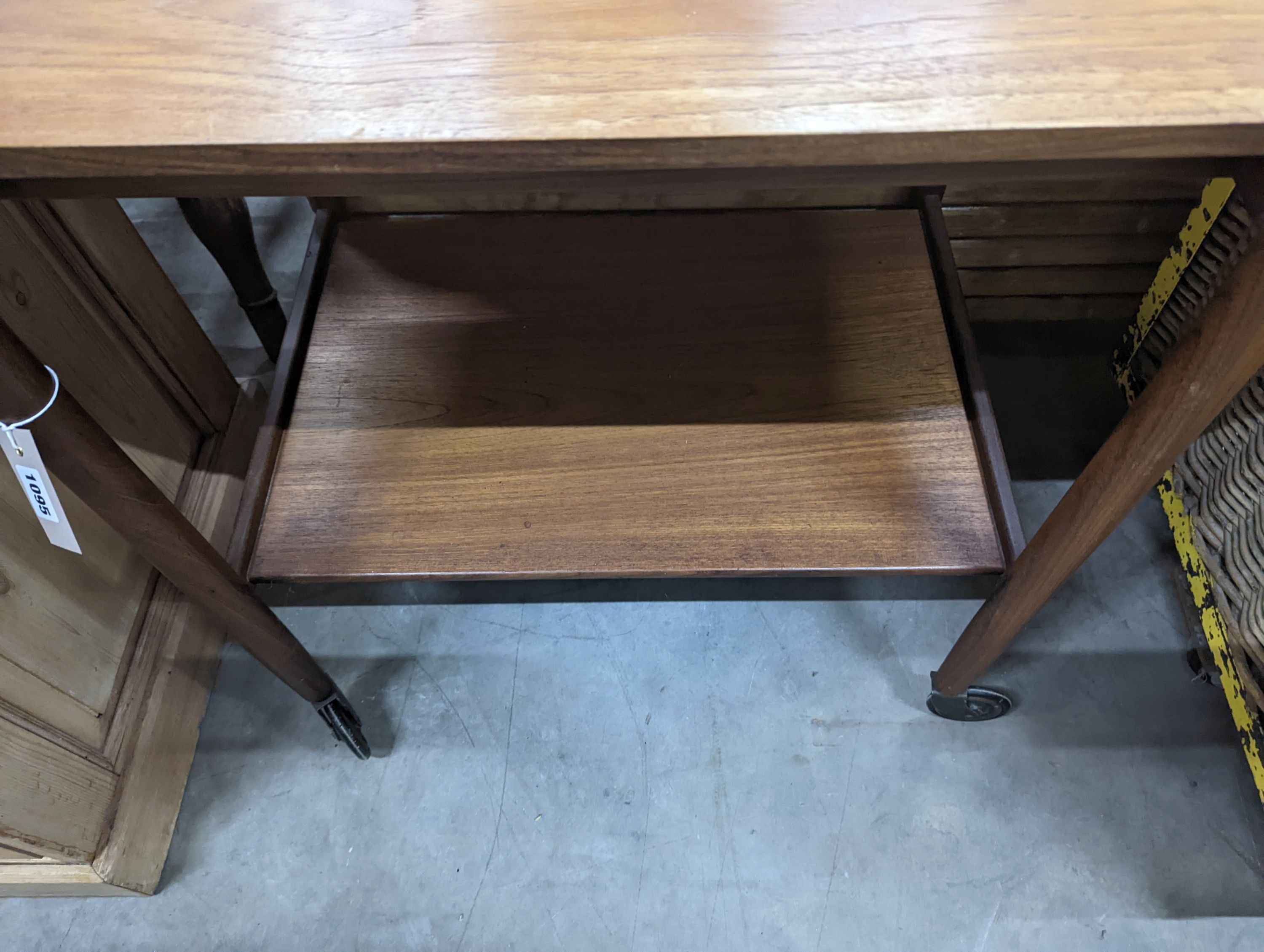A mid century design teak two tier tea trolley, length 79cm, depth 46cm, height 70cm